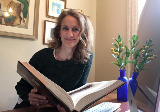 Karen Siatras at desk